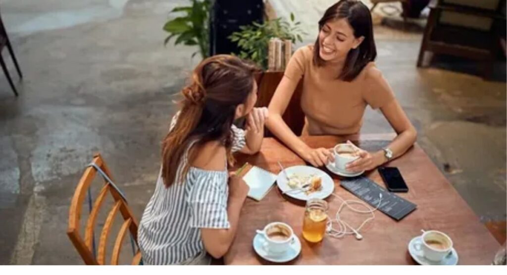 Friends sharing friendly good morning wishes during a cheerful morning, showing happiness and connection.
